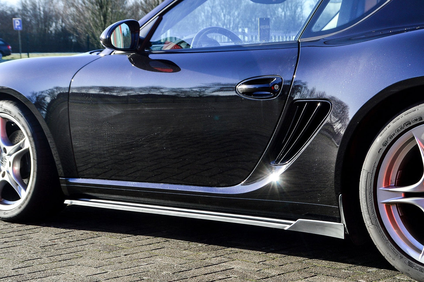 CUP Seitenschwellersatz mit Wing hinten Porsche Cayman 987 Schwarz Matt