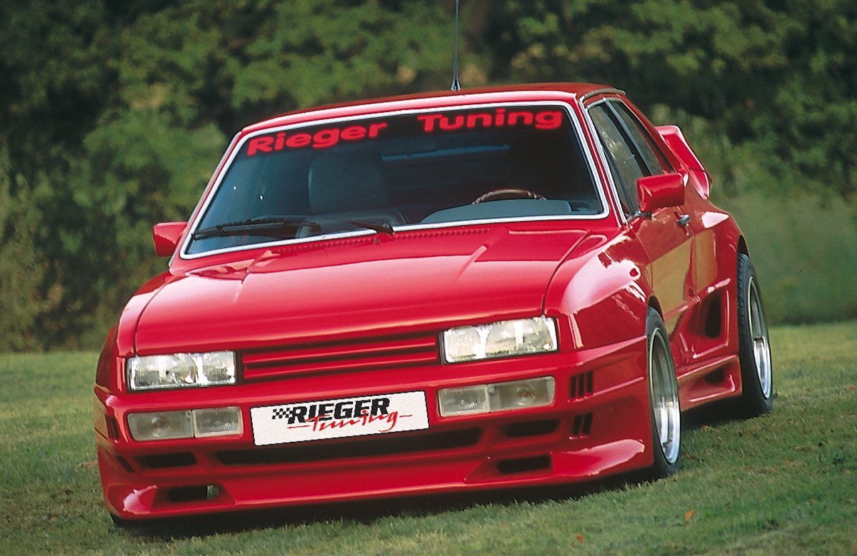 VW Scirocco 1 Rieger Spoilerstoßstange Breitbau II mit Aussparung für NSW, GFK,
Montagezubehör