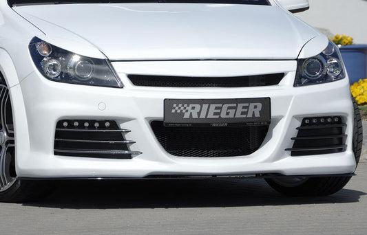 Opel Astra H Rieger Spoilerstoßstange  mit Aussparung für Tagfahrleuchten, ABS, für Fzg. mit OPC und ohne OPC, 
inkl. Montagezubehör, Alugitter, Lüftungsschacht, Lufteinlassblende, ABE