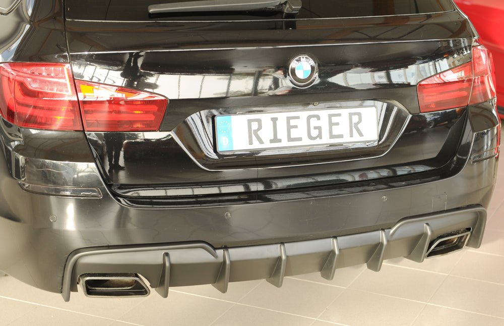 BMW 5er F10  (5L) Rieger Heckeinsatz (für Fzg. mit AHK) für orig. Endrohrblende li. u. re., (550i / 550i xDrive / M550d xD...