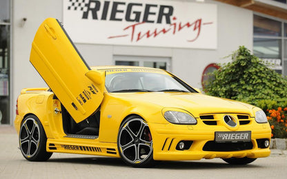 Mercedes SLK (R170) Rieger Spoilerstoßstange (orig. NSW passen nicht mehr) mit seitlichen Rippen, offen, ABS, für Fzg. mit Scheinwerferreinigungsanlage, NSW, 
inkl. Alugitter, Montagezubehör, ABE