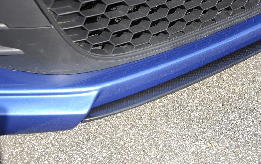 VW Scirocco 3 (13) Rieger Spoilerschwert für Spoilerlippe 14100 mittig, für Spoilerlippe, ABS, Carbon-Look, 
inkl. Montagezubehör, ABE