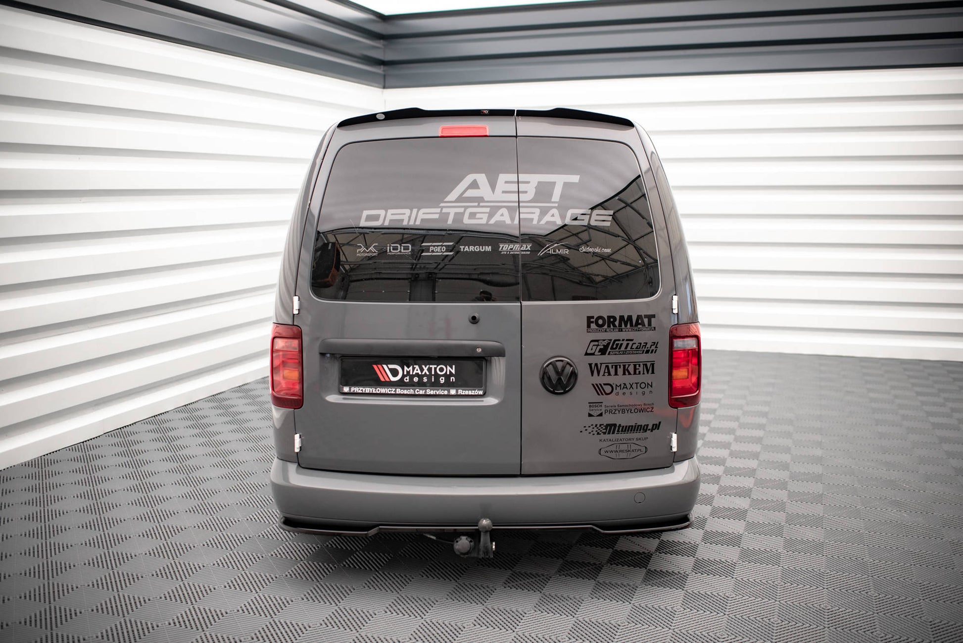 Mittlerer Diffusor Heck Ansatz für Volkswagen Caddy Long Mk3 Facelift schwarz Hochglanz