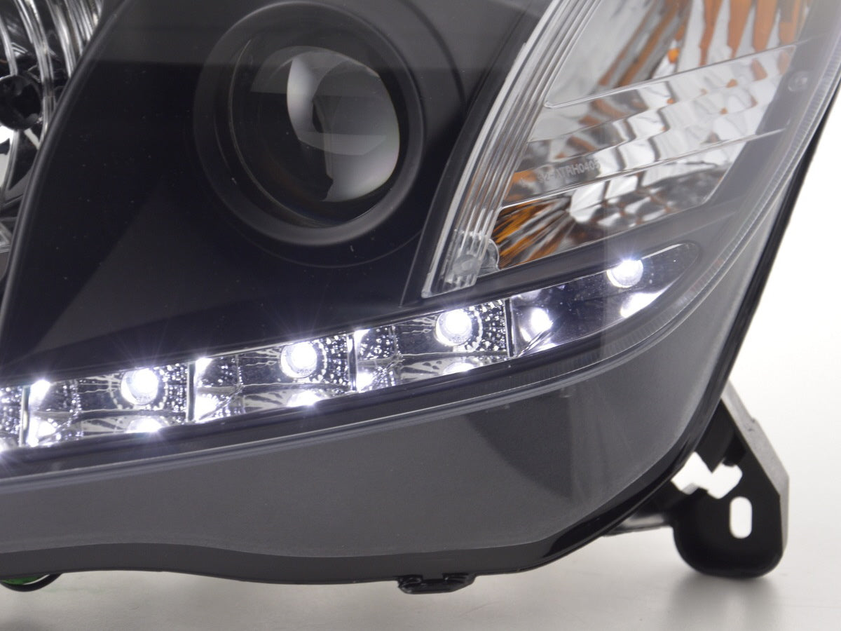 Scheinwerfer Set Daylight LED TFL-Optik Opel Astra H Bj. 04-10 schwarz für Rechtslenker