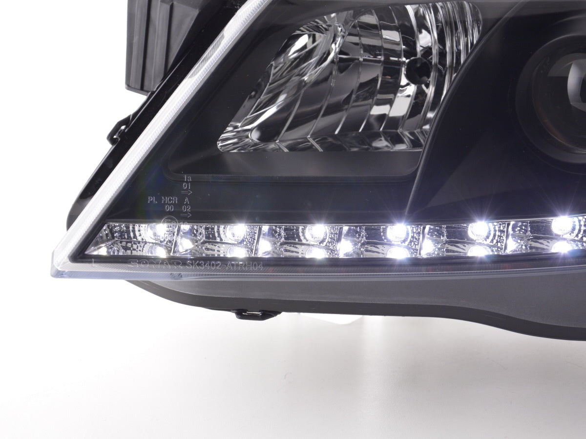 Scheinwerfer Set Daylight LED TFL-Optik Opel Astra H Bj. 04-10 schwarz für Rechtslenker