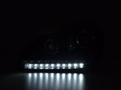 Scheinwerfer Set gebraucht Daylight LED TFL-Optik Porsche Cayenne Bj. 03-07 schwarz