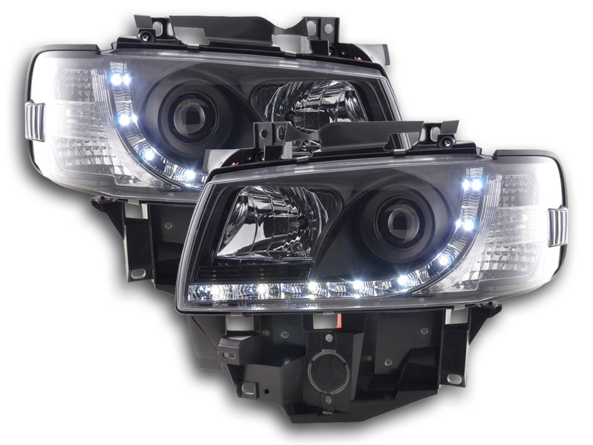 Scheinwerfer Set Daylight LED TFL-Optik VW Bus Typ T4 Bj. 96-03 schwarz für Rechtslenker