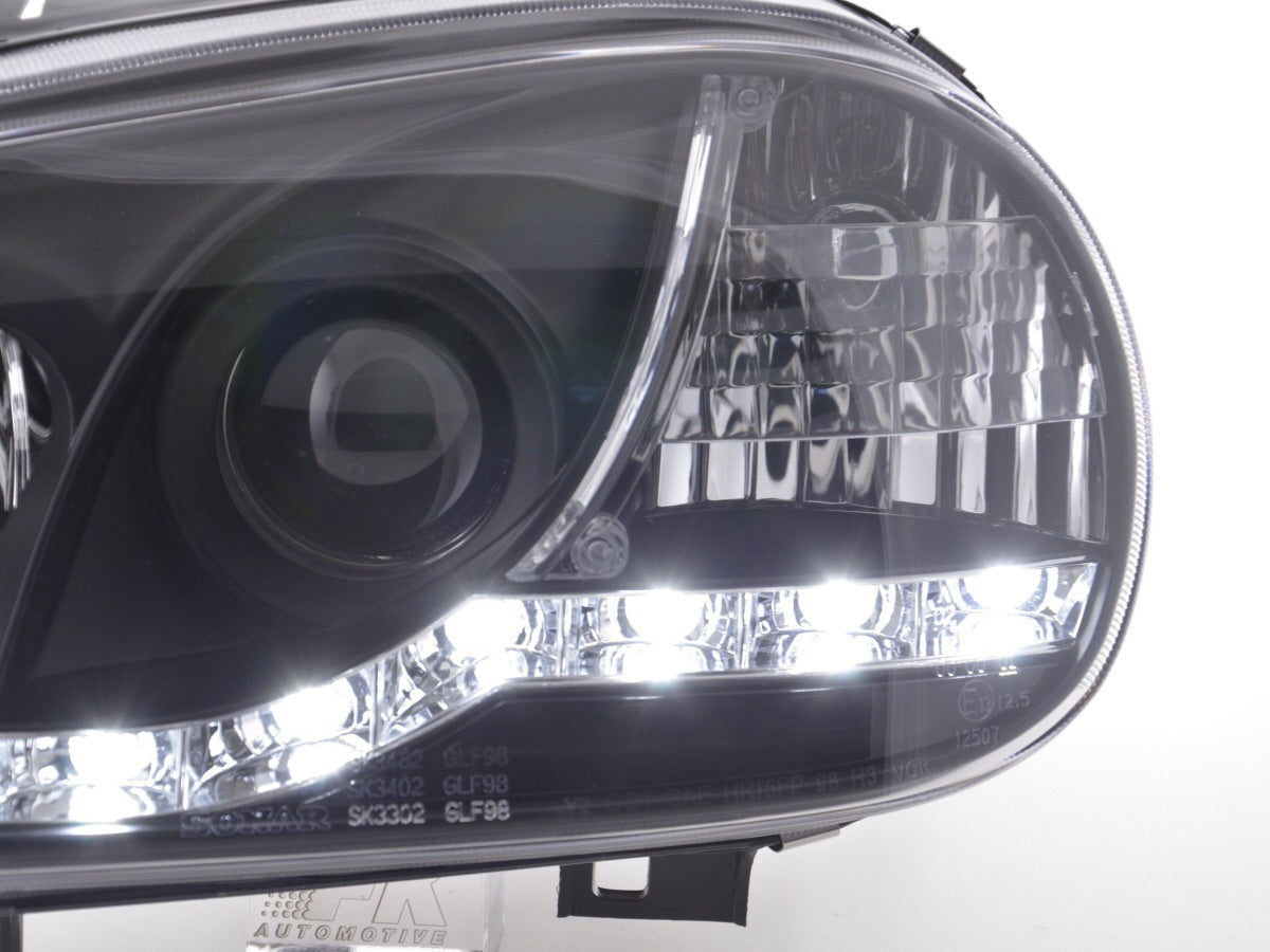 Scheinwerfer Set Daylight LED Tagfahrlicht VW Golf 4 Bj. 97-03 schwarz für Rechtslenker